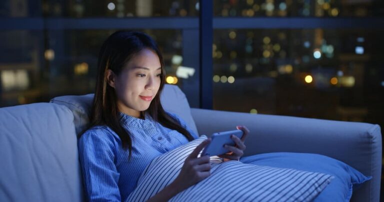 woman watching video on phone