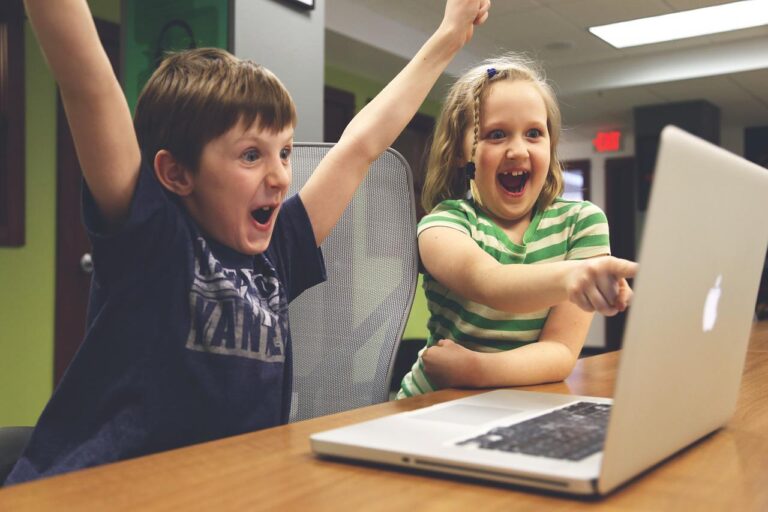 happy kids watching a video