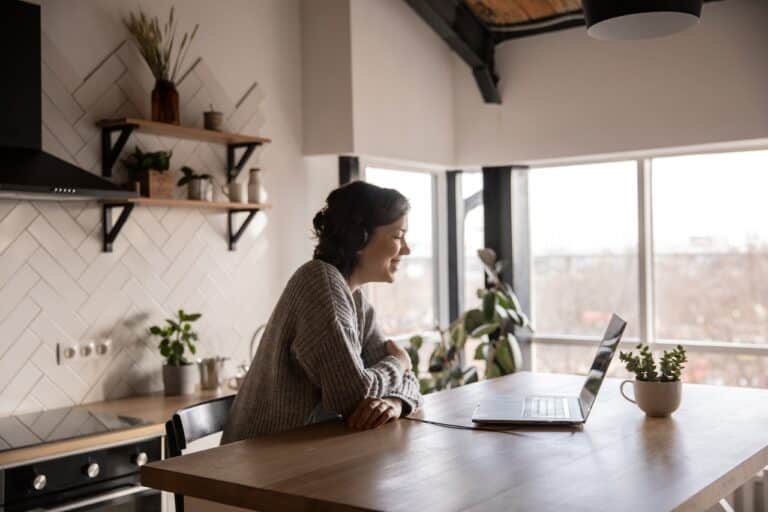 woman looking at laptop